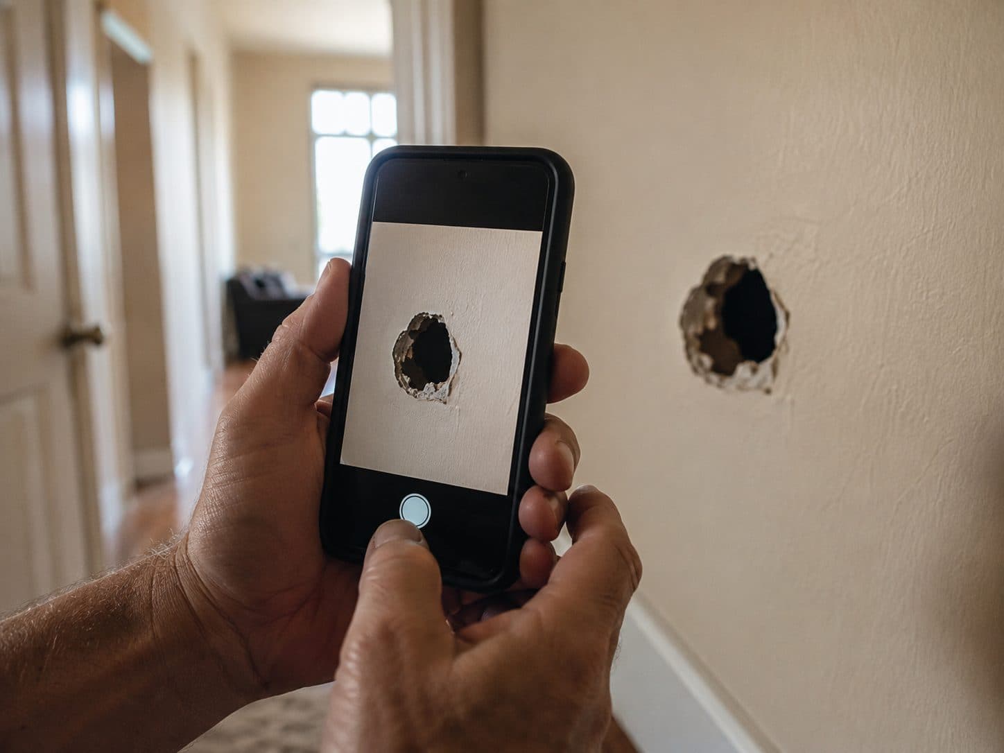 Photographing wall damage with a phone for a photo estimate