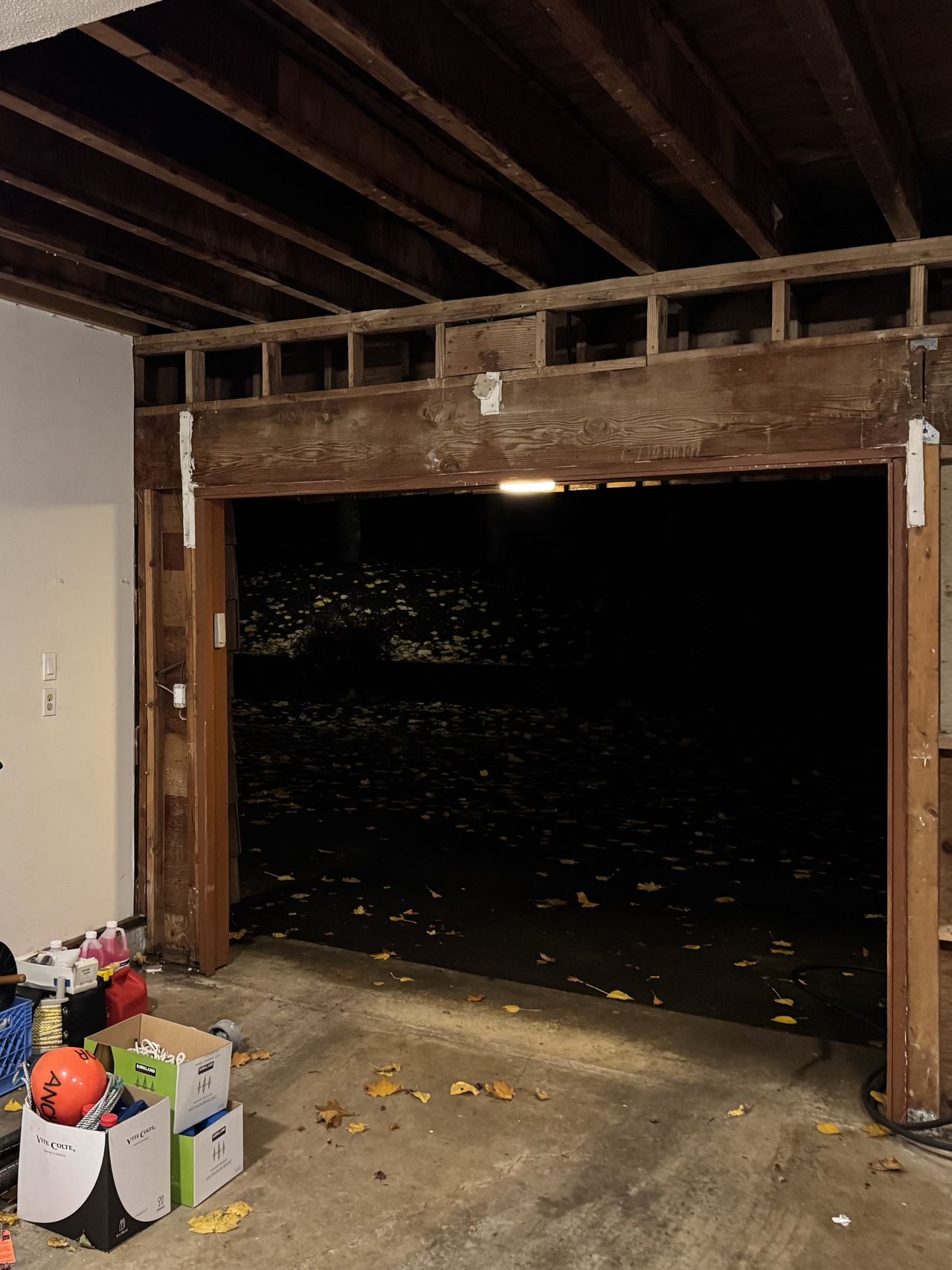 Garage wall and ceiling open to the framing and joists