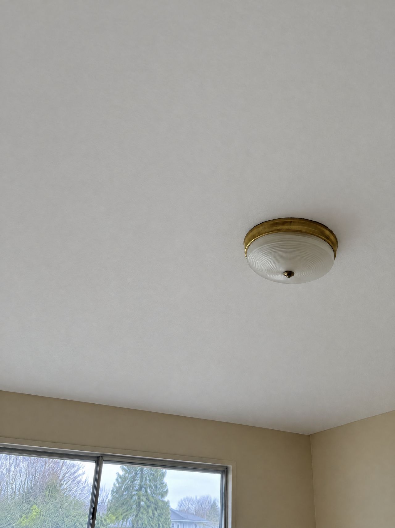 The same ceiling made smooth and painted white