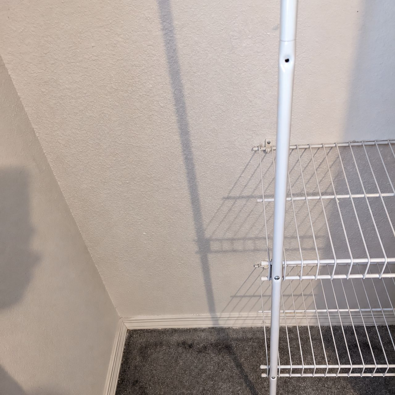 The closet wall closed up and textured to match, shelving back in place
